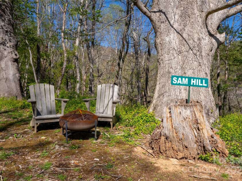 96 Winding Way, Canton, NC 28716.  MLS# CAR4248874, YatesRealty ID 15030. Sitting Area Uphill from Back of Home with a View