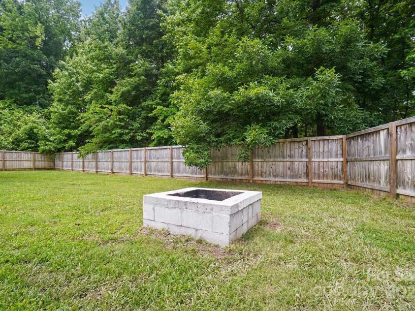 12382 Ritchie Road, Midland, NC 28107.  MLS# CAR4258214, YatesRealty ID 15036. Fire Pit