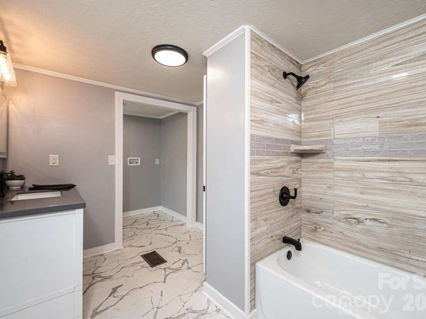 2088 Stamey Road, Hudson, NC 28638.  MLS# CAR4360859, YatesRealty ID 15036. Stylish Updated Tile