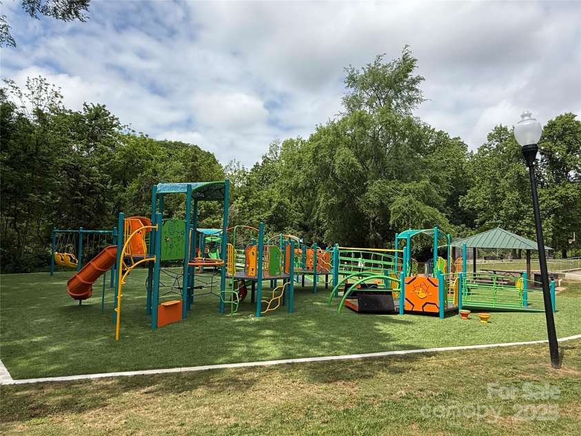 2638 Double Oaks Road, Charlotte, NC 28206.  MLS# CAR4252717, YatesRealty ID 15041. Large playground is such a delight for children.