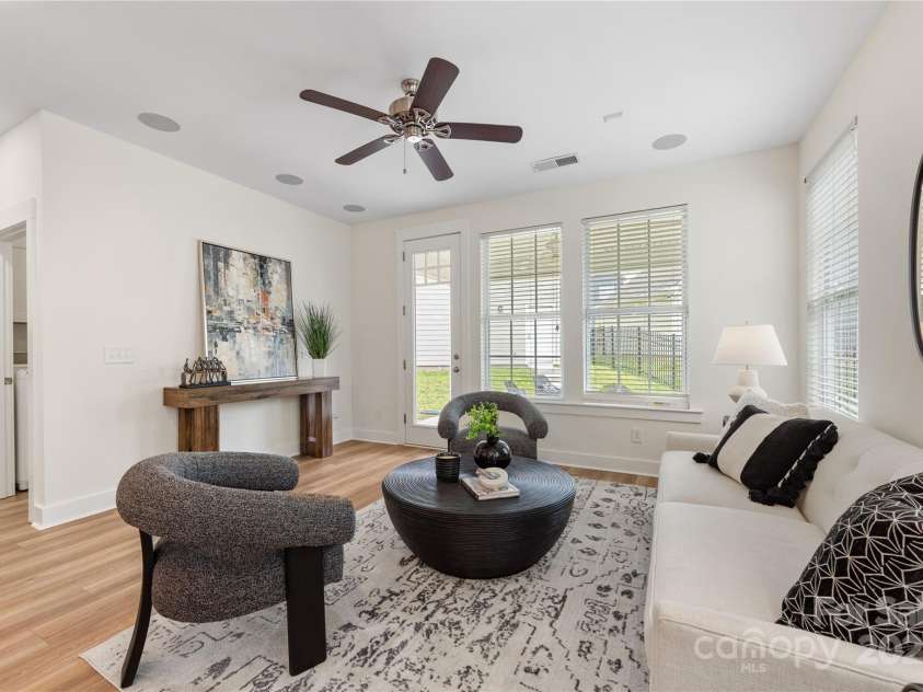 2638 Double Oaks Road, Charlotte, NC 28206.  MLS# CAR4252717, YatesRealty ID 15041. Living room area has access to the covered porch and backyard.