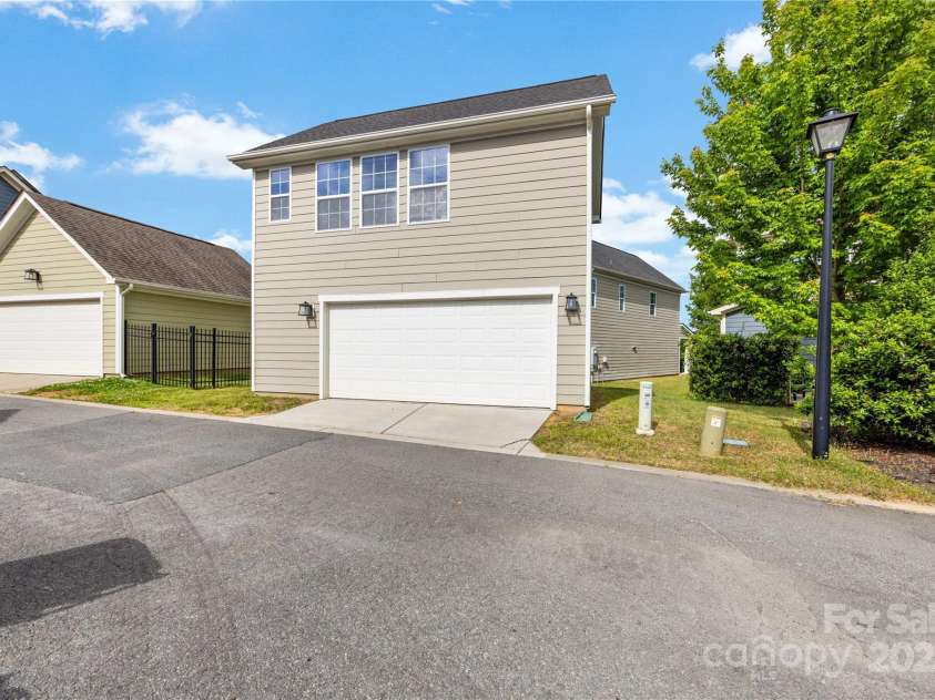 2638 Double Oaks Road, Charlotte, NC 28206.  MLS# CAR4252717, YatesRealty ID 15041. Rear view of detached garage from alley access road.