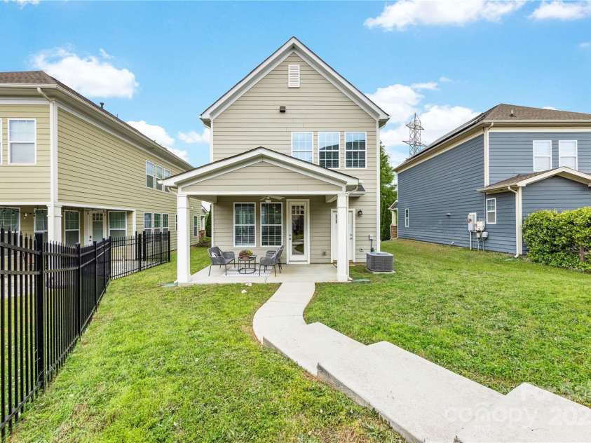 2638 Double Oaks Road, Charlotte, NC 28206.  MLS# CAR4252717, YatesRealty ID 15041. Rear view of home from garage.
