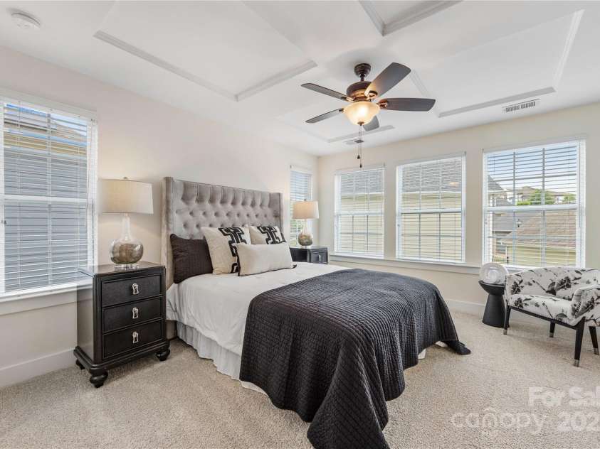 2638 Double Oaks Road, Charlotte, NC 28206.  MLS# CAR4252717, YatesRealty ID 15041. Serene primary bedroom with coffered ceiling offers peaceful repose.