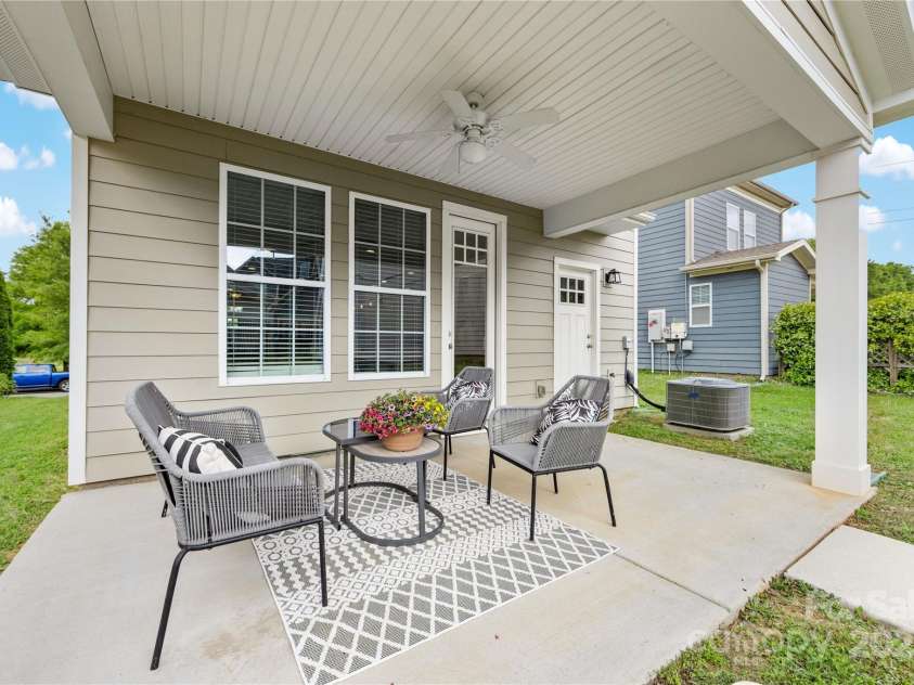 2638 Double Oaks Road, Charlotte, NC 28206.  MLS# CAR4252717, YatesRealty ID 15041. This covered patio is a great place to enjoy your morning cup of coffee!