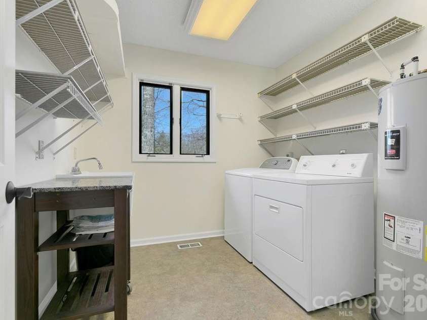 400 Middle Connestee Trail, Brevard, NC 28712.  MLS# CAR4354726, YatesRealty ID 15049. Laundry