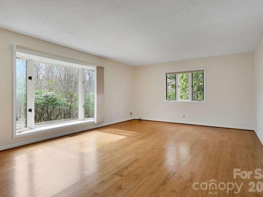 400 Middle Connestee Trail, Brevard, NC 28712.  MLS# CAR4354726, YatesRealty ID 15049. Living room