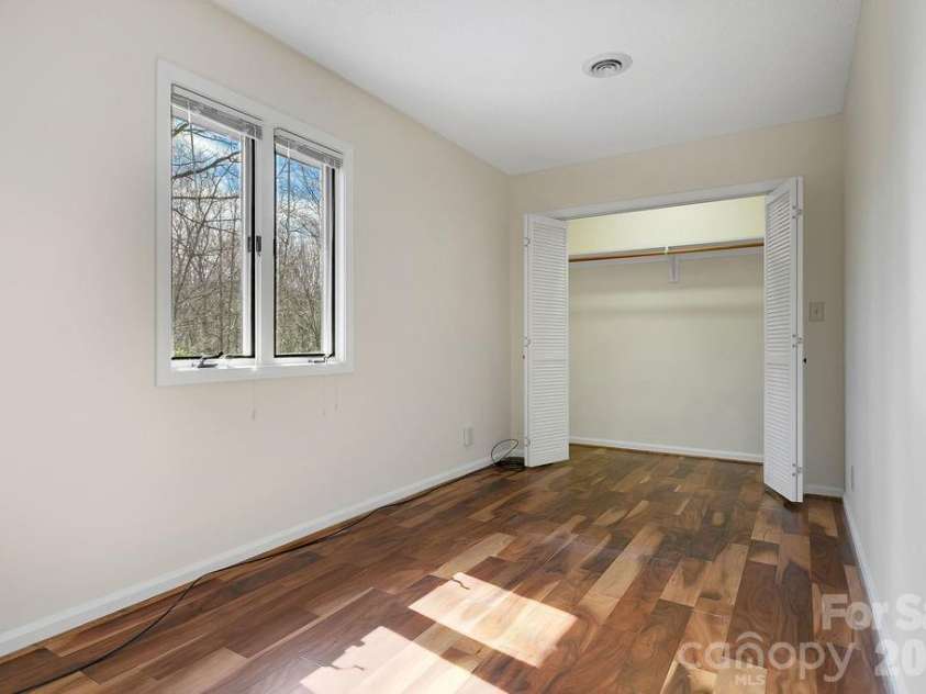 400 Middle Connestee Trail, Brevard, NC 28712.  MLS# CAR4354726, YatesRealty ID 15049. Upper bedroom (4)