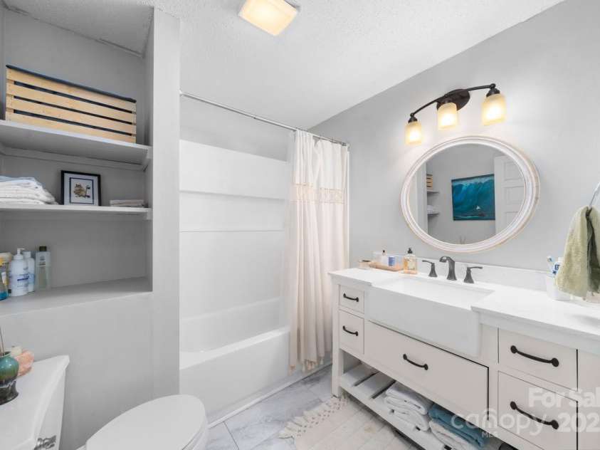 102 Jody Street, East Flat Rock, NC 28726.  MLS# CAR4241091, YatesRealty ID 15050. Up Stairs Bathroom