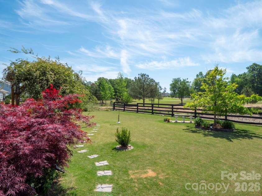 4303 Bent Green Lane, Monroe, NC 28112.  MLS# CAR4351446, YatesRealty ID 15056. Golf Course View From Backyard