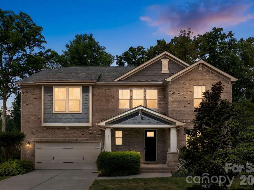 220 Kingsdown Avenue, Charlotte, NC 28270.  MLS# CAR4359368, YatesRealty ID 15060. Front Exterior - Twilight