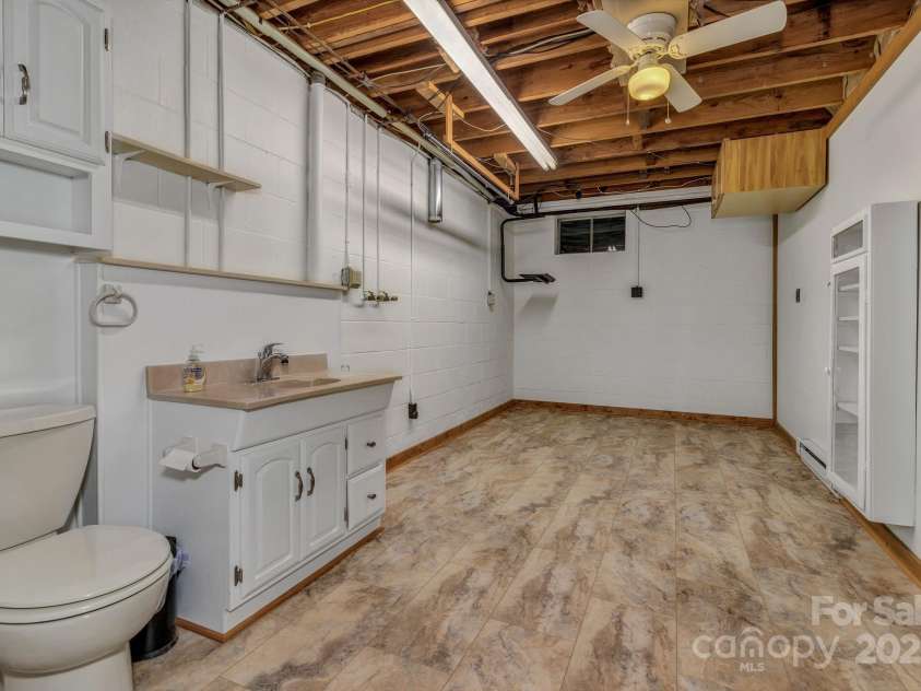 8 Chunns View Drive, Asheville, NC 28805.  MLS# CAR4258237, YatesRealty ID 15062. Lower level