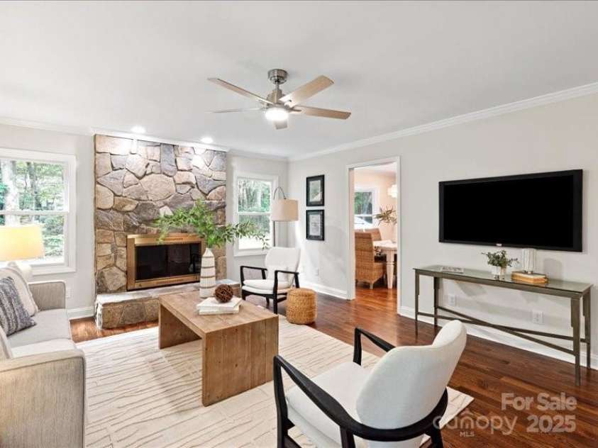 300 Hugh Crocker Road, Matthews, NC 28104.  MLS# CAR4254720, YatesRealty ID 15063. Gorgeous Stone Fireplace is the focal point of the family room. Fireplace is wood burning.