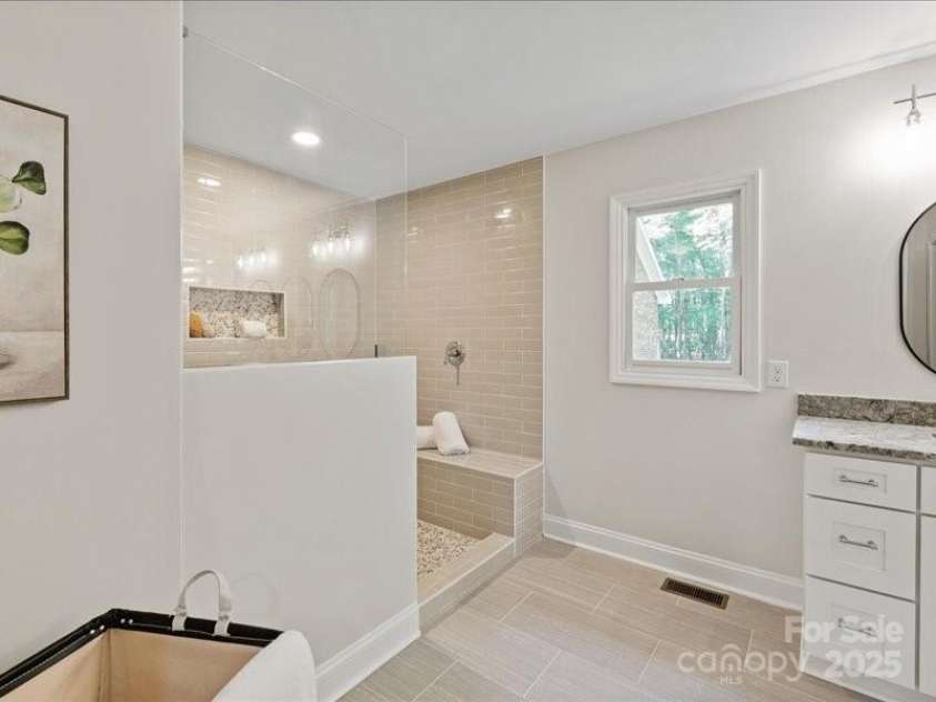 300 Hugh Crocker Road, Matthews, NC 28104.  MLS# CAR4254720, YatesRealty ID 15063. Primary Bath with Beautiful Walk-in Shower