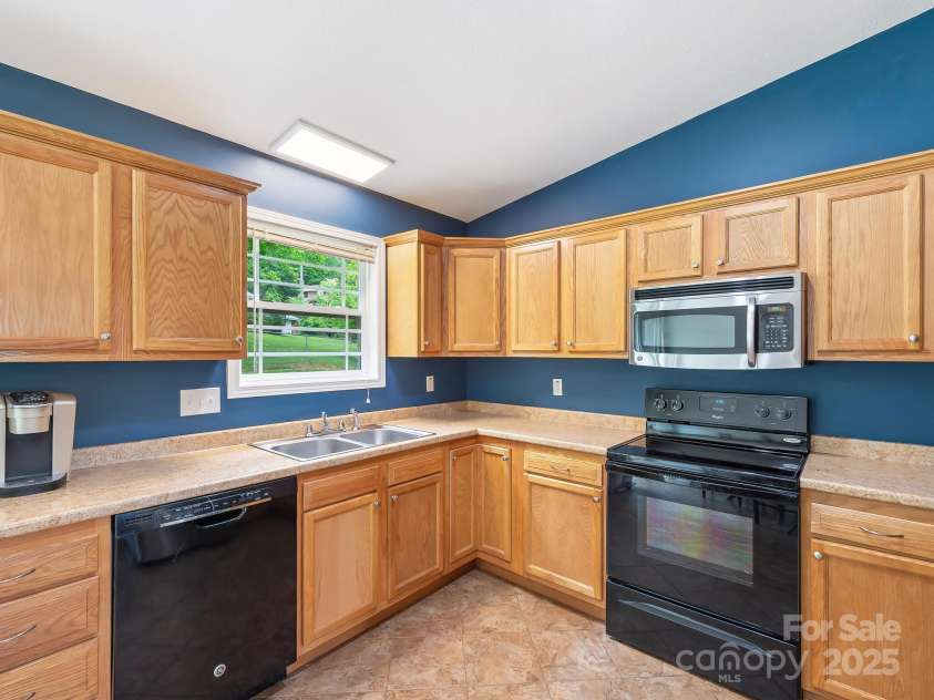 618 Enka Lake Road, Candler, NC 28715.  MLS# CAR4260345, YatesRealty ID 15064. 