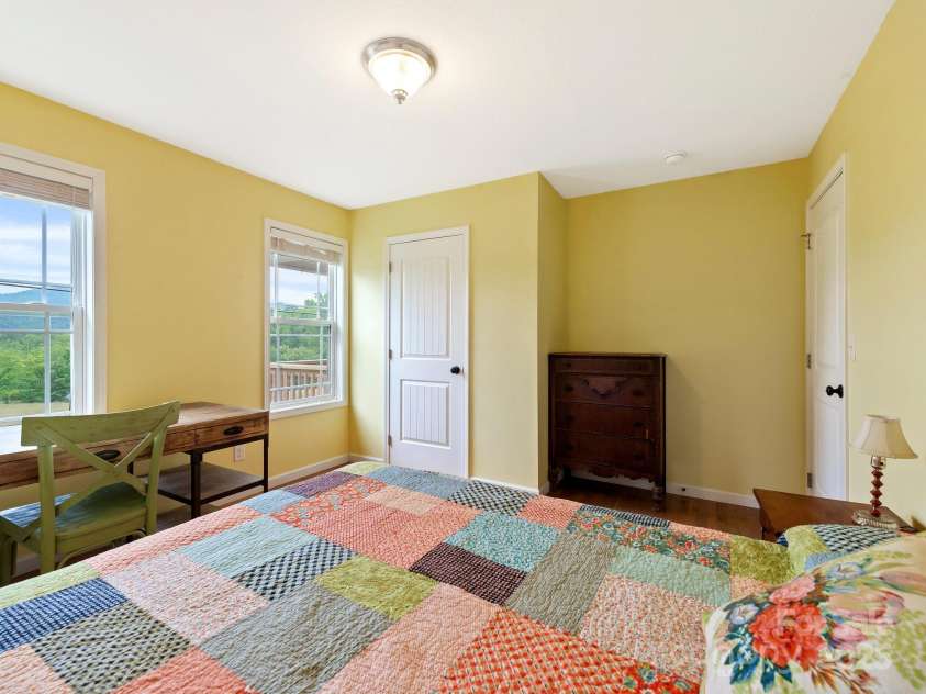 618 Enka Lake Road, Candler, NC 28715.  MLS# CAR4260345, YatesRealty ID 15064. Bedroom 2 with views