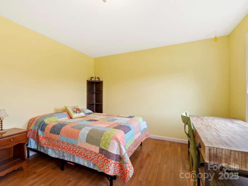 618 Enka Lake Road, Candler, NC 28715.  MLS# CAR4260345, YatesRealty ID 15064. Bedroom 2 with views