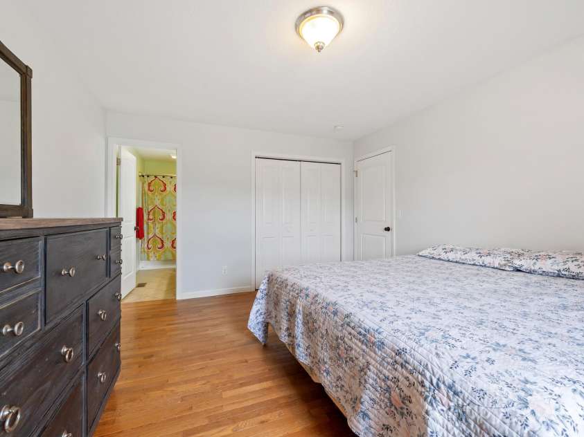 618 Enka Lake Road, Candler, NC 28715.  MLS# CAR4260345, YatesRealty ID 15064. Ensuite Primary Bedroom