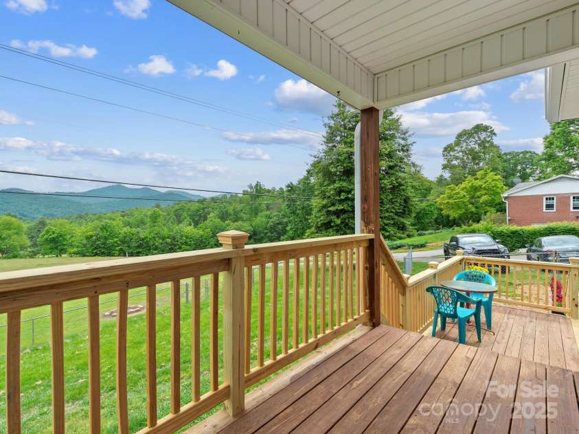 618 Enka Lake Road, Candler, NC 28715.  MLS# CAR4260345, YatesRealty ID 15064. Mountain views from your front porch