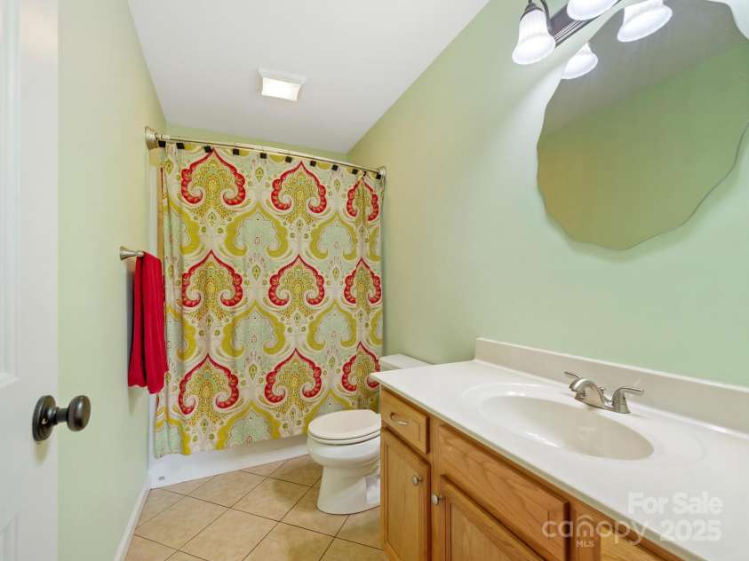 618 Enka Lake Road, Candler, NC 28715.  MLS# CAR4260345, YatesRealty ID 15064. Primary Bathroom