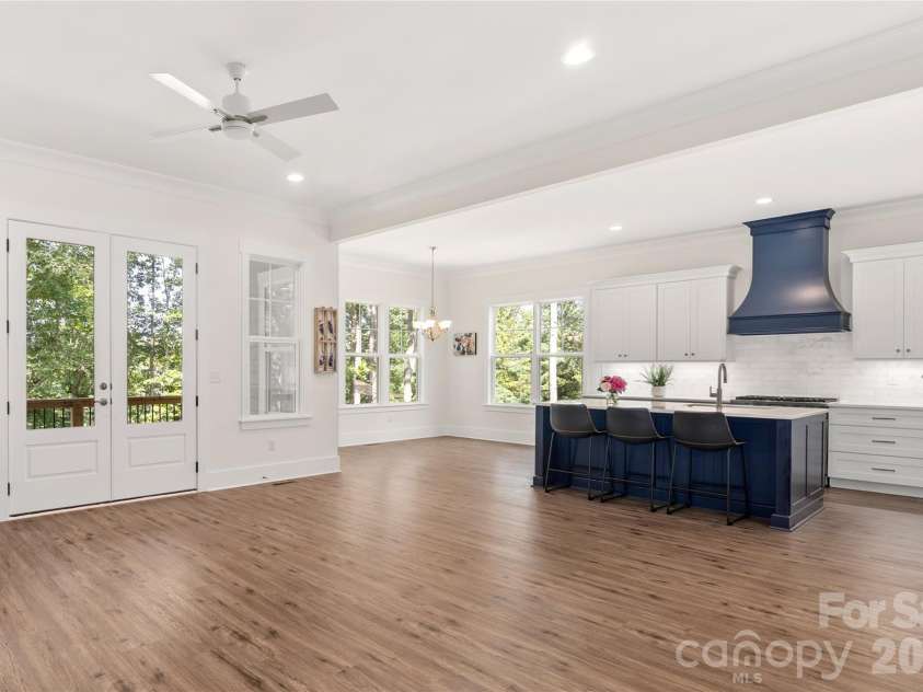 227 Northview Drive, Hendersonville, NC 28791.  MLS# CAR4359426, YatesRealty ID 15068. Great room looking towards kitchen