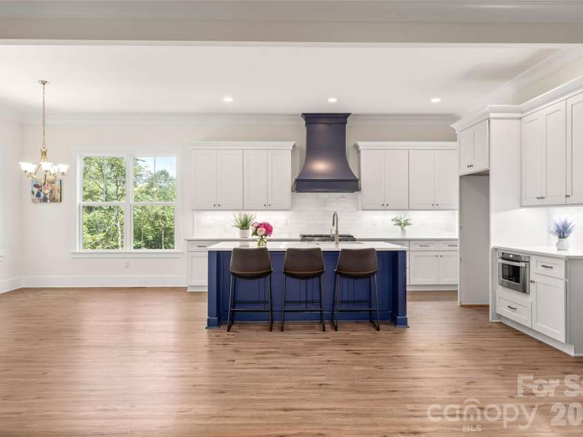 227 Northview Drive, Hendersonville, NC 28791.  MLS# CAR4359426, YatesRealty ID 15068. Great room looking towards kitchen