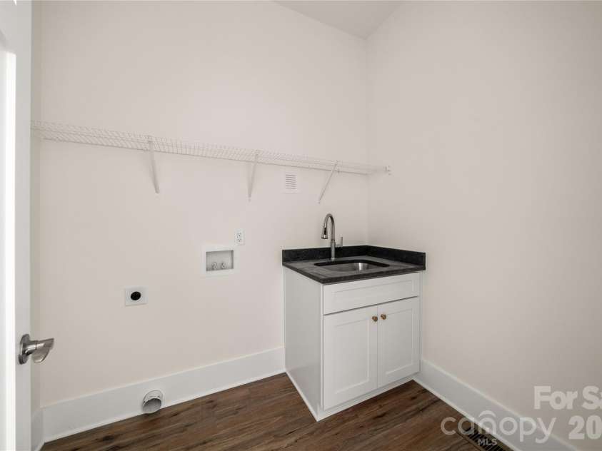 227 Northview Drive, Hendersonville, NC 28791.  MLS# CAR4359426, YatesRealty ID 15068. Laundry room