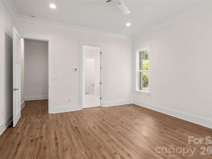 227 Northview Drive, Hendersonville, NC 28791.  MLS# CAR4359426, YatesRealty ID 15068. Main-level primary suite