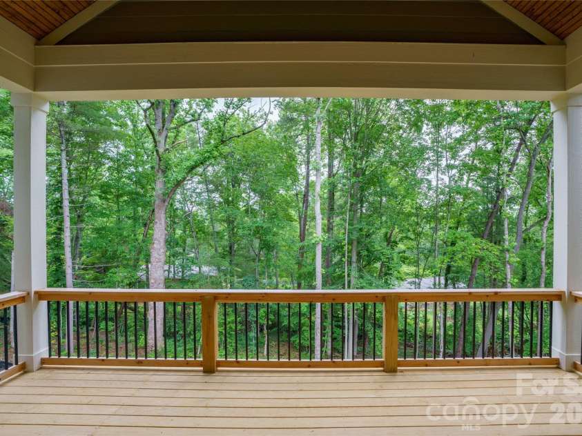 227 Northview Drive, Hendersonville, NC 28791.  MLS# CAR4359426, YatesRealty ID 15068. Private serene deck