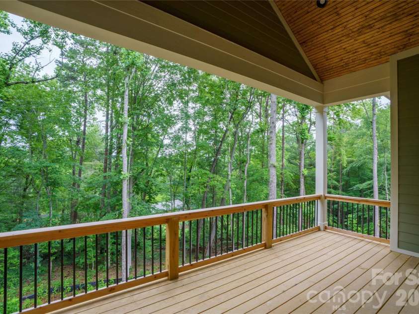 227 Northview Drive, Hendersonville, NC 28791.  MLS# CAR4359426, YatesRealty ID 15068. Private serene deck
