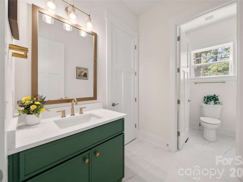 227 Northview Drive, Hendersonville, NC 28791.  MLS# CAR4359426, YatesRealty ID 15068. SECOND primary main-level suite bathroom
