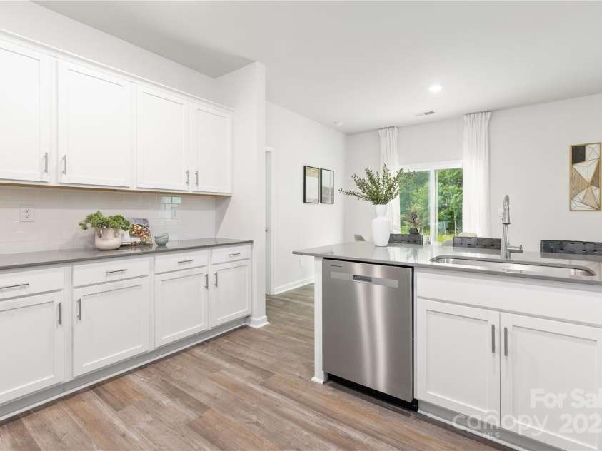 8024 Kennesaw Drive, Gastonia, NC 28056.  MLS# CAR4212004, YatesRealty ID 15069. Kitchen has lots of cabinets and countertop space!