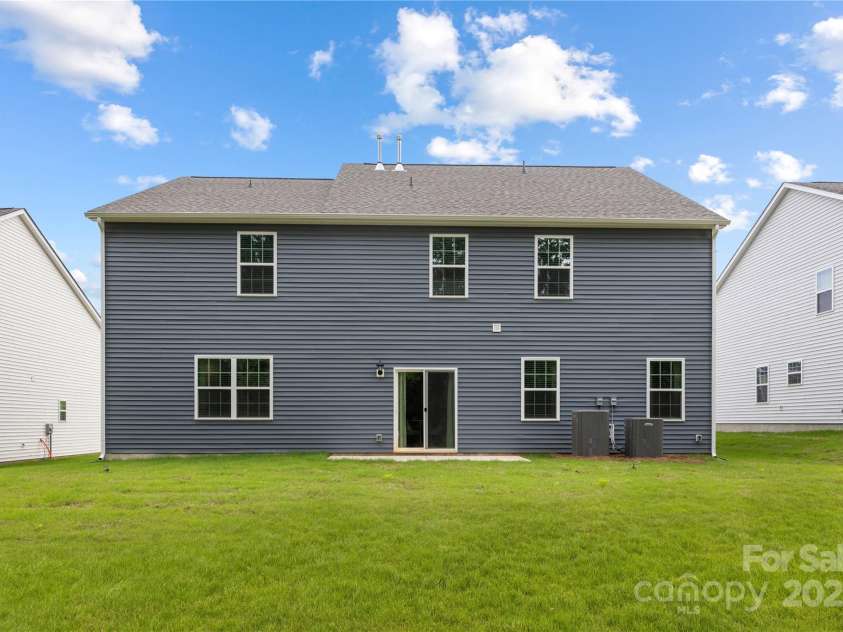 8024 Kennesaw Drive, Gastonia, NC 28056.  MLS# CAR4212004, YatesRealty ID 15069. Rear of Home, beautiful homesite!