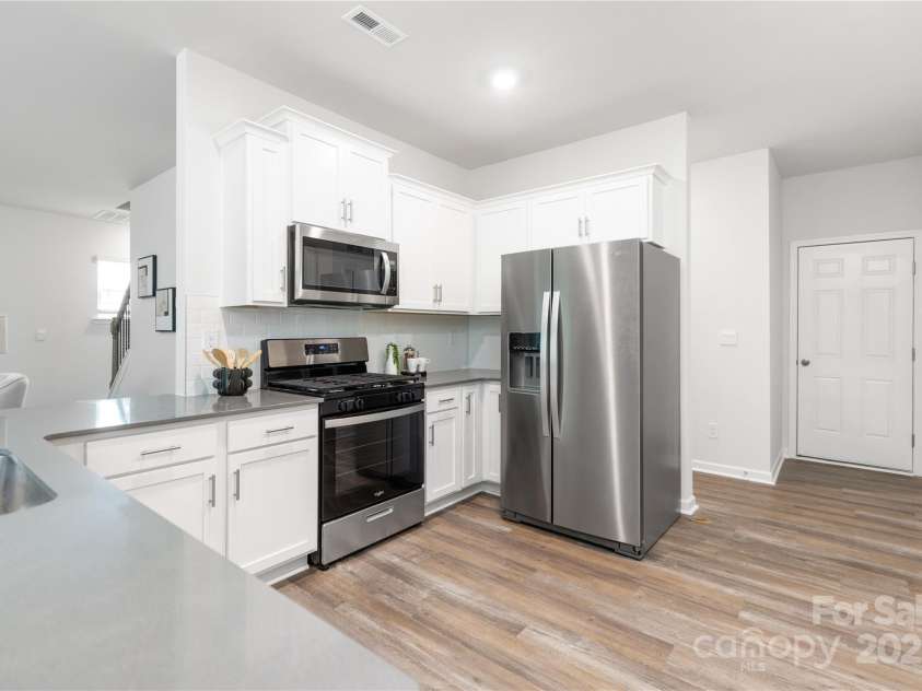 8024 Kennesaw Drive, Gastonia, NC 28056.  MLS# CAR4212004, YatesRealty ID 15069. Spacious Kitchen, fridge included!