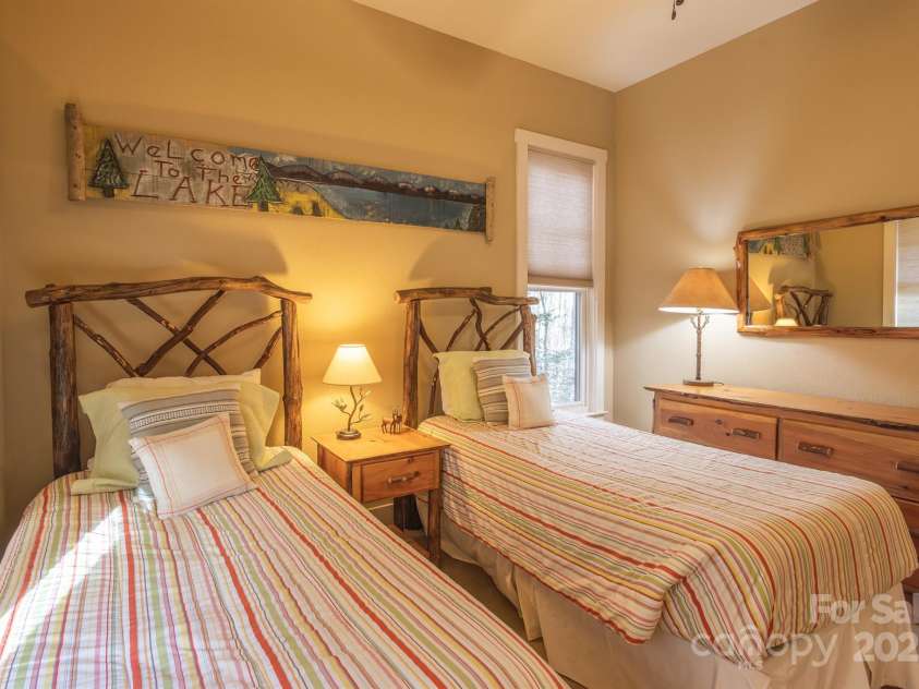 150 Saddle Notch Lane, Tuckasegee, NC 28783.  MLS# CAR4205859, YatesRealty ID 15074. Guest room