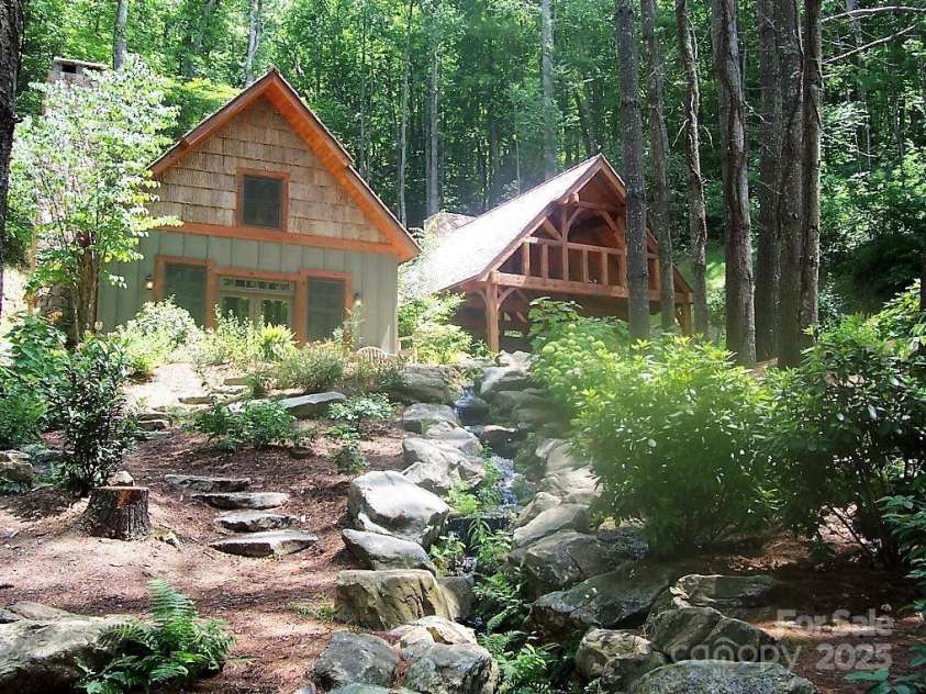 150 Saddle Notch Lane, Tuckasegee, NC 28783.  MLS# CAR4205859, YatesRealty ID 15074. Mill Pond