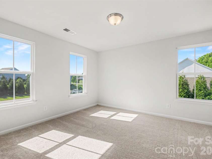 824 Abbeywood Drive, Waxhaw, NC 28173.  MLS# CAR4372119, YatesRealty ID 15074. Upper level bedroom.