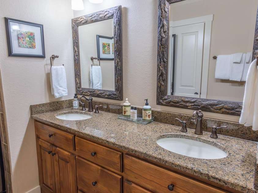 150-2 Saddle Notch Lane, Tuckasegee, NC 28783.  MLS# CAR4181029, YatesRealty ID 15075. Double vanities with granite counter tops