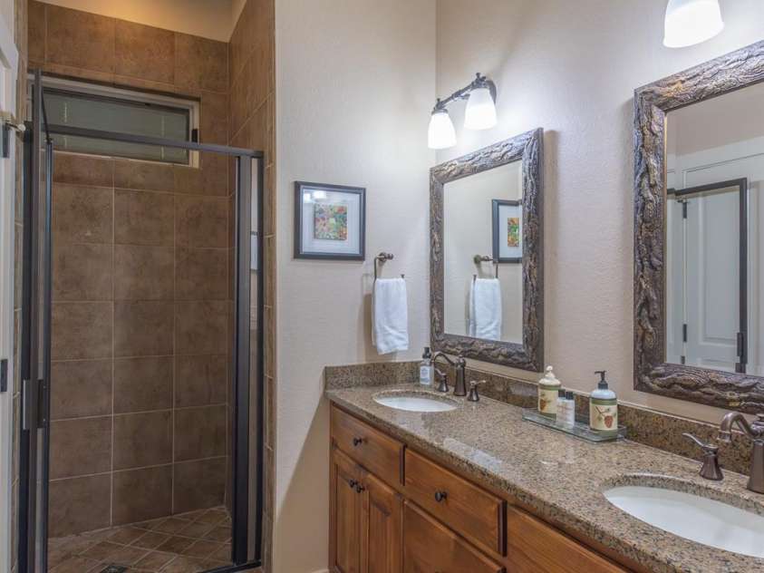 150-2 Saddle Notch Lane, Tuckasegee, NC 28783.  MLS# CAR4181029, YatesRealty ID 15075. Full walk in shower in master bath