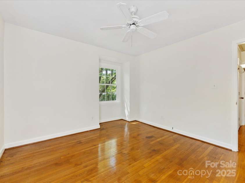 5114 Glenbrier Drive, Charlotte, NC 28212.  MLS# CAR4238590, YatesRealty ID 15076. Downstairs Bedroom