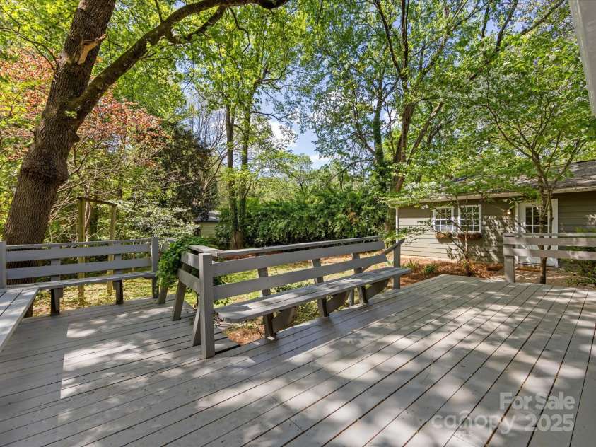 5114 Glenbrier Drive, Charlotte, NC 28212.  MLS# CAR4238590, YatesRealty ID 15076. Spacious deck overlooks beautiful yard