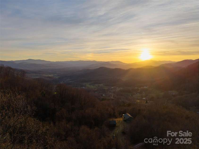 506 Rocky Acres Road, Canton, NC 28716.  MLS# CAR4327605, YatesRealty ID 1508. Long range sunset views from your back porch! 