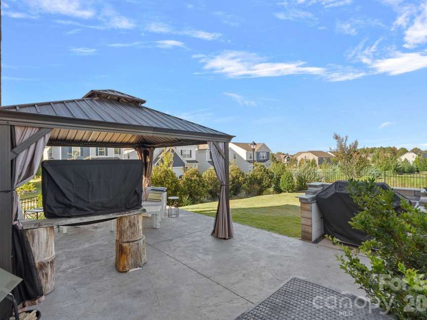 6499 Gopher Road, Lancaster, SC 29720.  MLS# CAR4429310, YatesRealty ID 15080. Large outdoor patio comes with pergola and grill!
