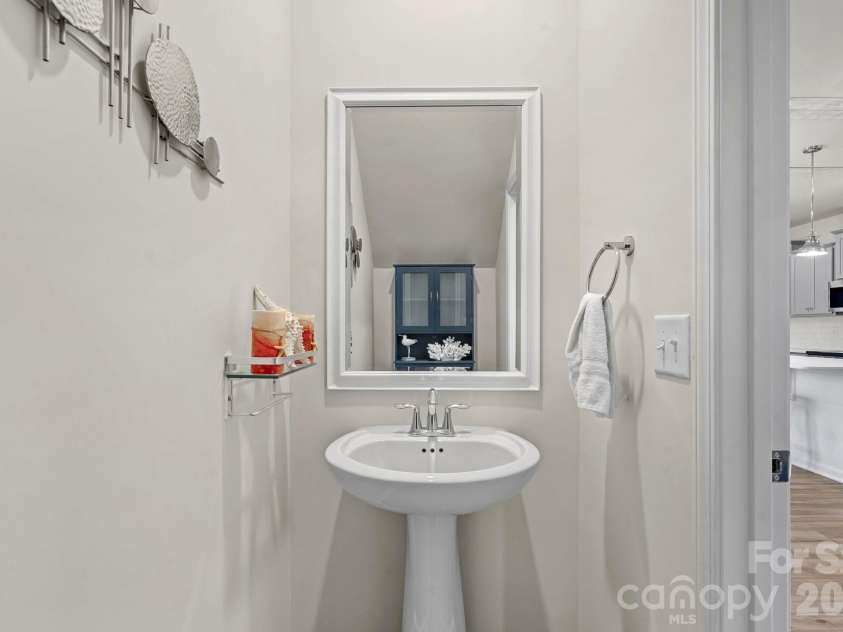 6499 Gopher Road, Lancaster, SC 29720.  MLS# CAR4429310, YatesRealty ID 15080. Main level half bath