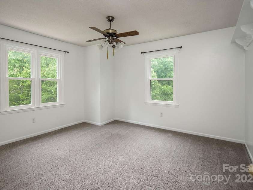 916 Rollingwood Drive, Mount Holly, NC 28120.  MLS# CAR4241352, YatesRealty ID 15080. Bedroom 4 New Carpet May 2025