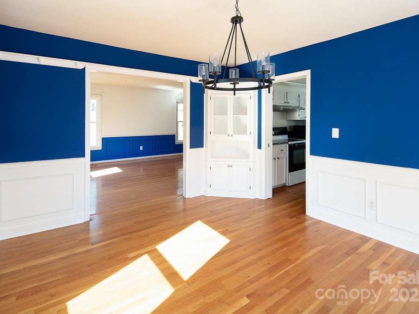 916 Rollingwood Drive, Mount Holly, NC 28120.  MLS# CAR4241352, YatesRealty ID 15080. Built in Corner Cabinet in Dining Room