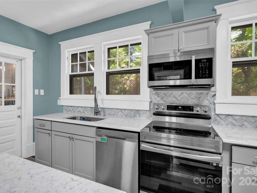 510 Wiley Avenue, Salisbury, NC 28144.  MLS# CAR4256119, YatesRealty ID 15082. Kitchen sink overlooks the side yard.