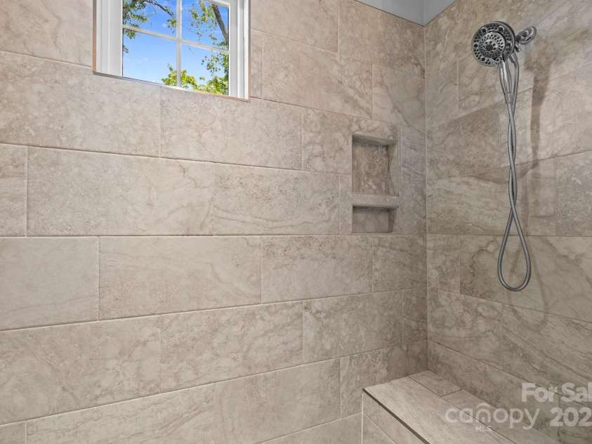 2925 Westfield Road, Charlotte, NC 28209.  MLS# CAR4254806, YatesRealty ID 15084. Over sized shower with double heads in owner's BA