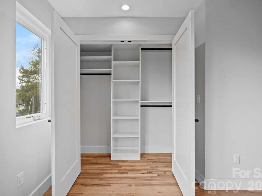 9 Gudger Road, Asheville, NC 28806.  MLS# CAR4406363, YatesRealty ID 15085. Bedroom Suite 2 Custom Closet