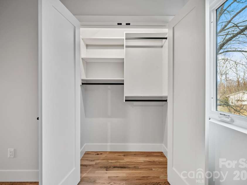 9 Gudger Road, Asheville, NC 28806.  MLS# CAR4406363, YatesRealty ID 15085. Bedroom Suite 3 Custom Closet